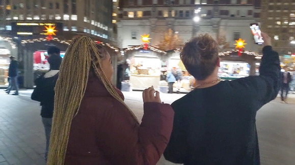 Tiktok star sings Disney songs to strangers to spread holiday cheer.