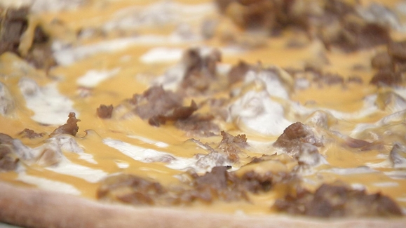 Cheesesteak meets pizza in an epic foodie collaboration