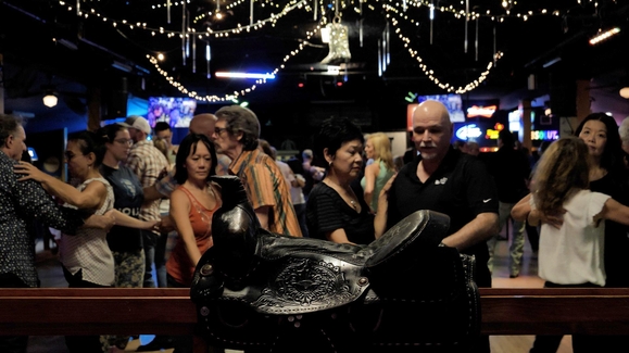 Neon Boots Dancehall offering free country dance lessons weekly