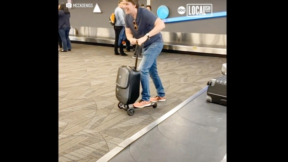 Riding a “Scootcase” Through Airports