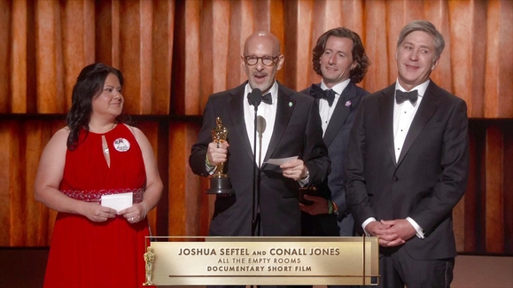 ALL THE EMPTY ROOMS Accepts the Oscar for Documentary Short Film